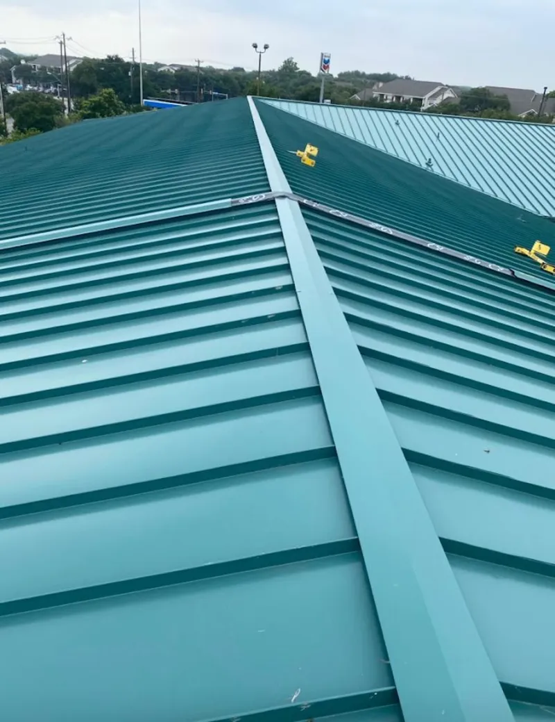 Green commercial metal roof ridge and valley for Metal Roof Repair in Lake Dallas