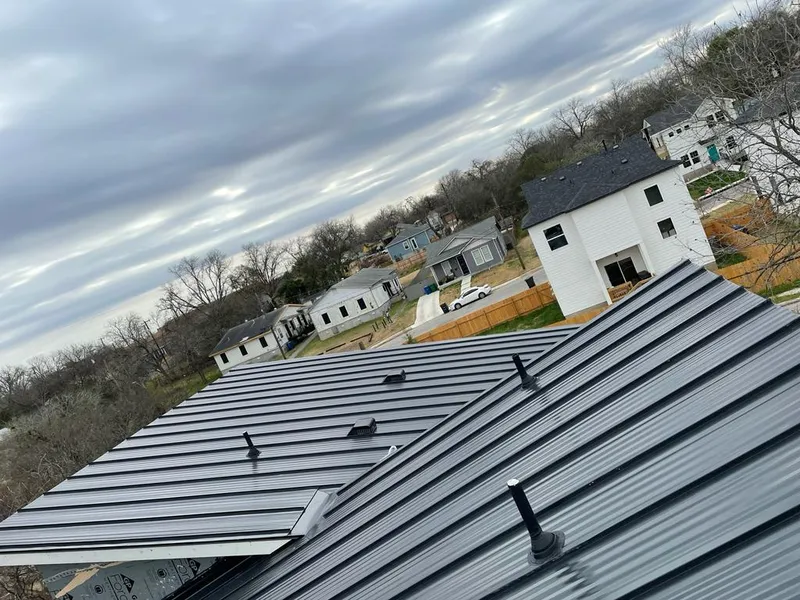 Standing seam metal roof panels with vents for Skylight Repair in Lake Dallas